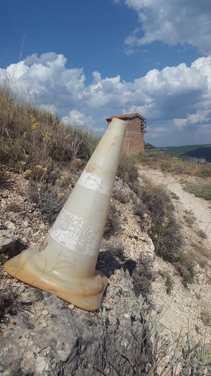 an old traffic cone on a hill just behind Cuenca, Spain